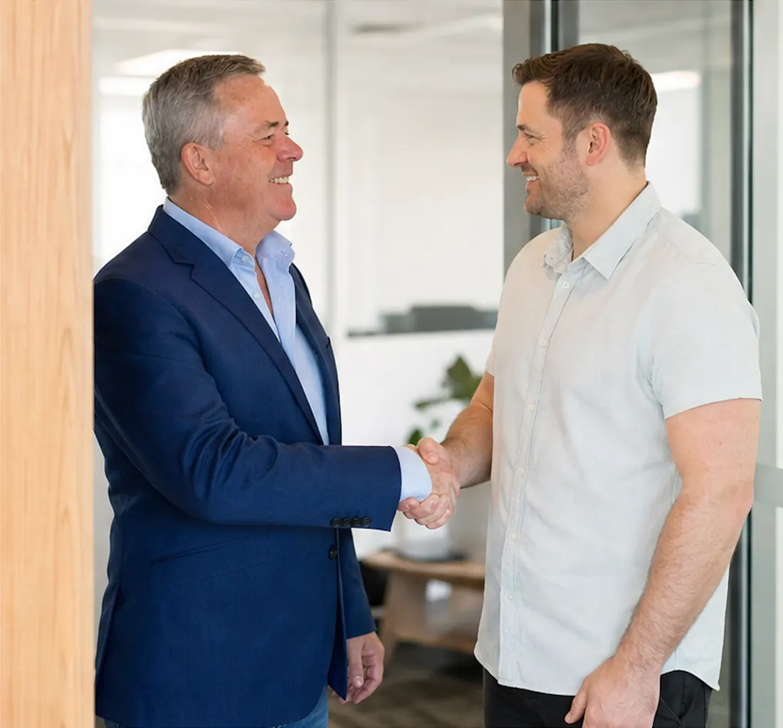 Paul Hillary greeting a client at the Coast 2 Coast Property Finance office